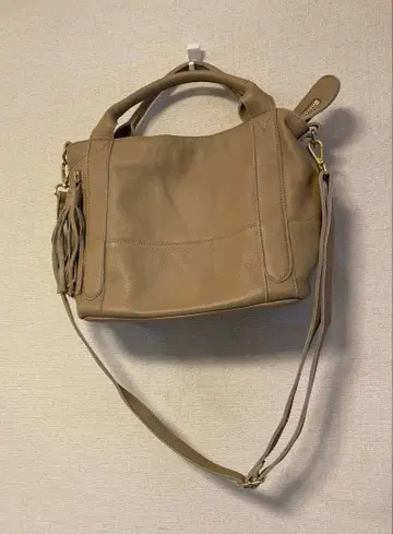 탑카피 TOPKAPI 베이지 가죽 숄더 프린지 백