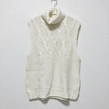 motti 모티 울 혼방 화이트 슬리브리스 니트 베스트 스웨터