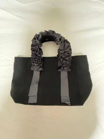 PROPORTION 블랙 핸드백