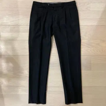 tagliatore 투 턱 울 슬랙스