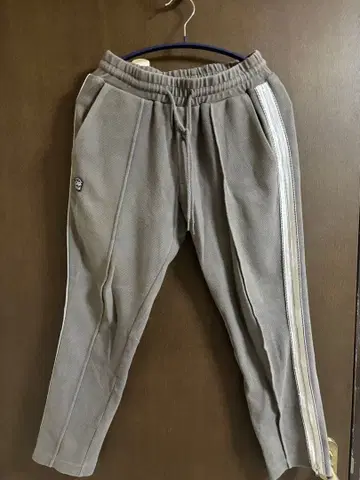 리베이로 사이드 스트라이프 조거 팬츠