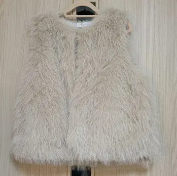 베이지 퍼 베스트 퀼팅 안감 부착