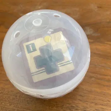 캡슐 토이 십자가 마크 포함