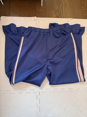 이뎀 사이드 라인 프릴 팬츠