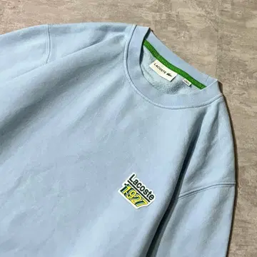 LACOSTE 러버 로고 맨투맨 스카이블루 자수 로고 라코스테