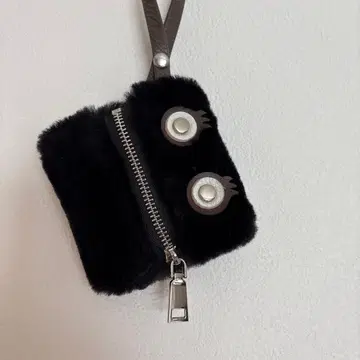 nouer 페이스 모티브 무스탕 파우치