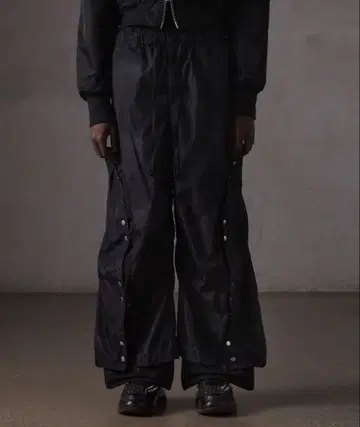 [ GRANCY ] 버튼 레이어드 디자인 나일론 팬츠