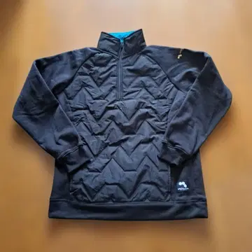 하프 지퍼 플리스 하이브리드 스웨터 블랙