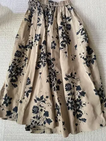 미라 오웬 롱 플레어 스커트 브라운