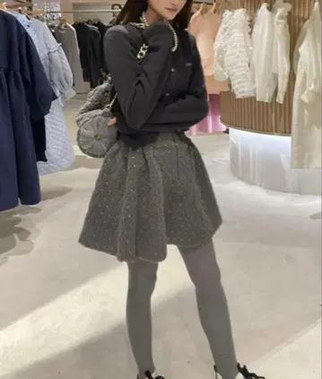 Bibiy. ODETTE BOA PLEATED SKIRT