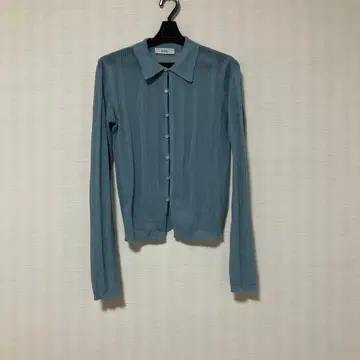 CLEIO 랜덤 리브 시어 폴로 니트