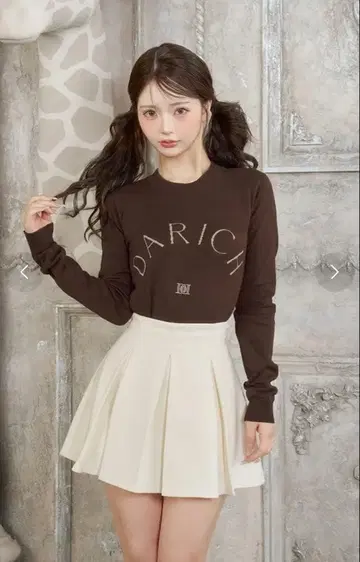 다리치 로고 니트탑