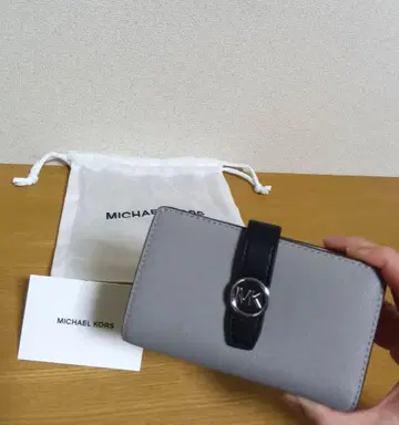 [ 마이클코어스 ] 미사용 새상품 접이식 지갑 수납 가방 포함