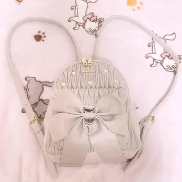 LIZLISA 메니 비쥬 롱 리본 백팩 핑크