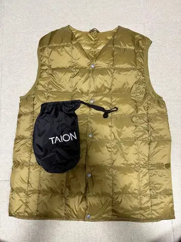 중고 미품 TAION 다운 베스트 올리브 수납 봉투 포함