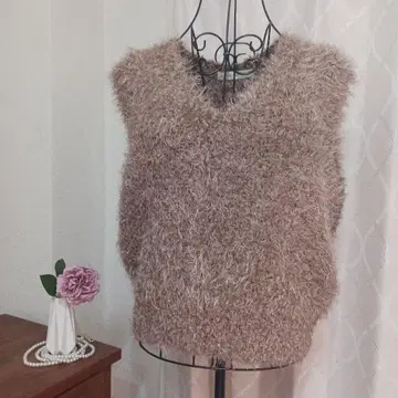 나노 유니버스 슬리브리스 스웨터