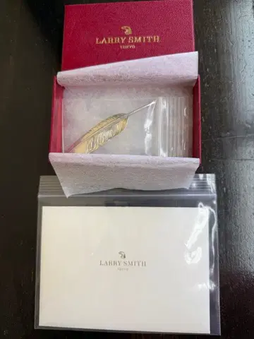 LARRY SMITH FEATHER LEFT