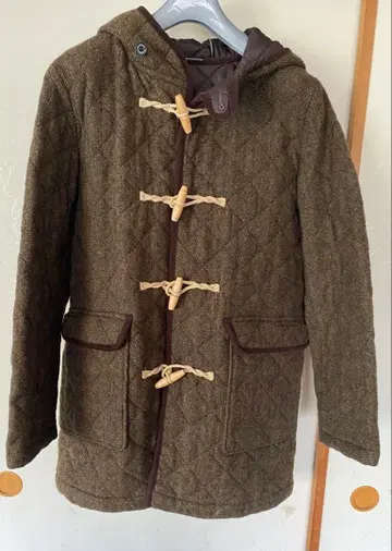 TRADITIONAL WEATHERWEAR 퀼팅 더플 후드