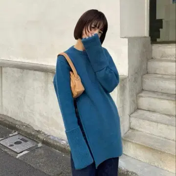 CLANE SLANT CUT KNIT TOPS