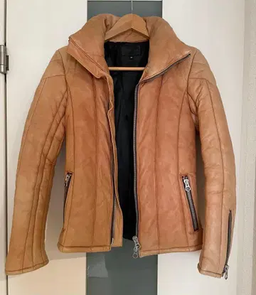 마더라이선스 다운 자켓