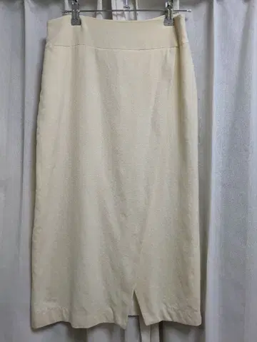 플라주 아이보리 울 슬릿 랩 스커트 36