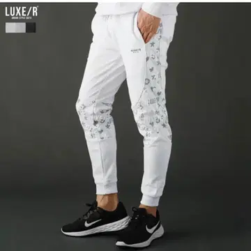 LUXE/R 절개 올 패턴 로고 조거 팬츠 화이트