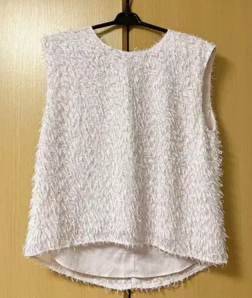 라이트 핑크 슬리브리스 상의