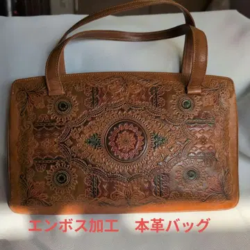 엠보싱 가공 가죽 핸드백