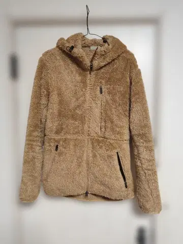 챔피온의 니트 자켓