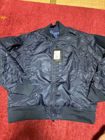 DAIWA PIER39 TECH REVERSIBLE MA-1 D NAVY