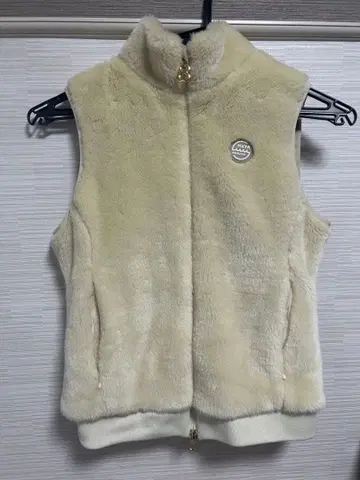 muta 플리스 베스트 크림색