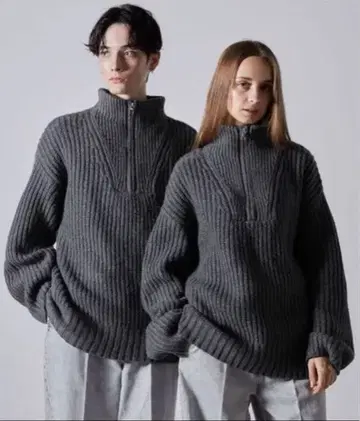 CLEL 볼륨 멜란지 하프 지퍼 니트