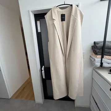 JEANASIS 베이지 롱 베스트 슬리브리스