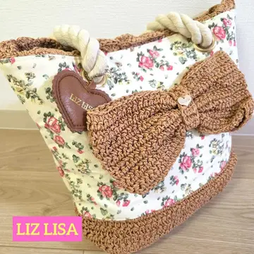 리즈리사 LIZ LISA 꽃무늬 바스켓 짜임 리본 하트 참 핸드 토트백