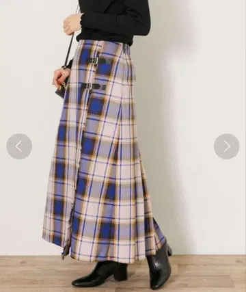 소니 레벨 랩 체크 플리츠 스커트