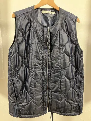 nonnative tourist puff vest
