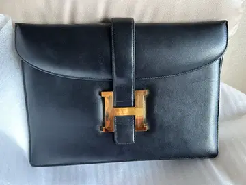 H 로고 블랙 가죽 클러치백