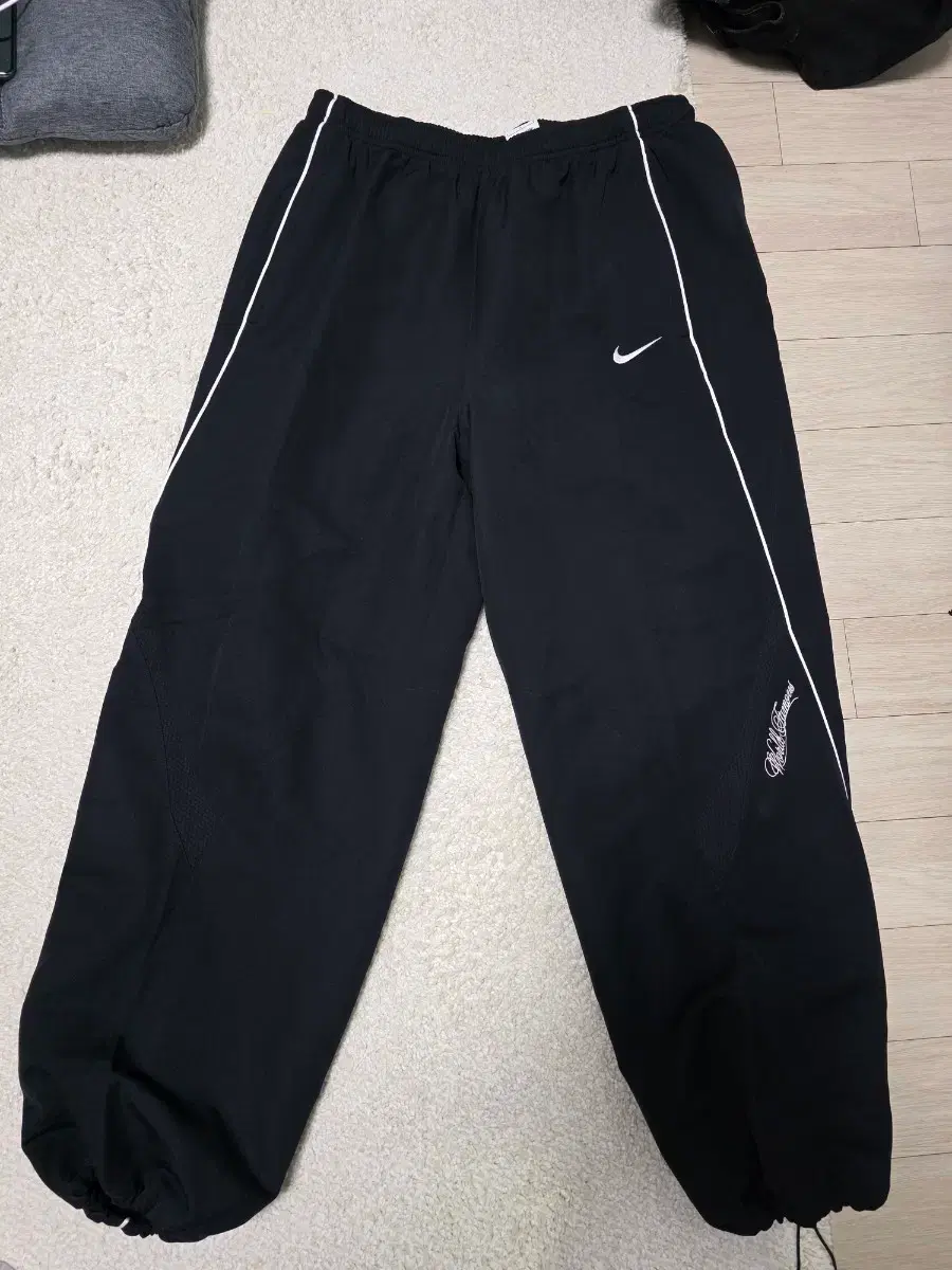 Supreme x Nike track pants black - 25SS for sale.