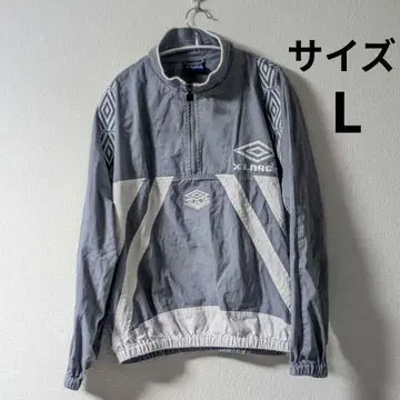 XLARGE x UMBRO HALF ZIP PULLOVER JACKET