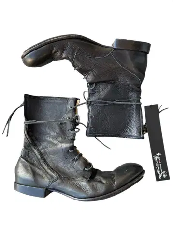 'kyoji maruyama'spiral zip leather boots