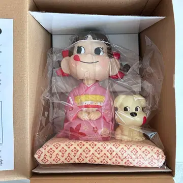 페코짱 앉아 고개 흔드는 인형