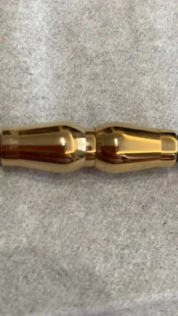 코란토테 목걸이 탑