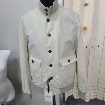 아이보리 스탠드 카라 자켓