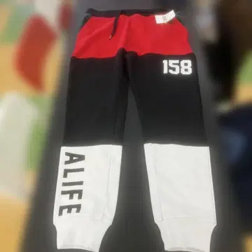 700 ALIFE 컬러 블록 조거 팬츠