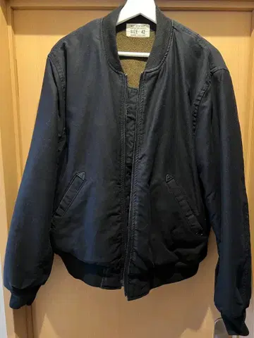 언클라우드 코튼 봄버 자켓