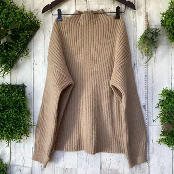 평평하게 놓았을 때 가슴 너비 52