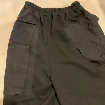 마나 하우스 블랙 팬츠 사이드 포켓 포함