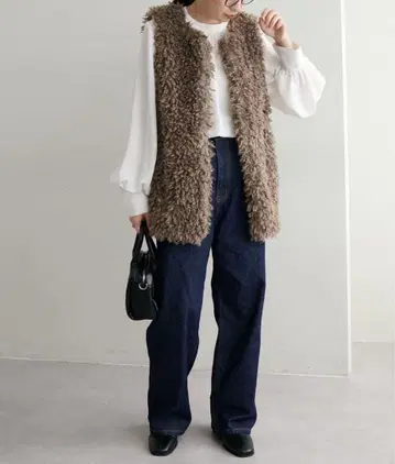 새상품 택 포함 디스코트 컬리 퍼 베스트