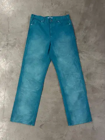 AURALEE Washed denim work pants