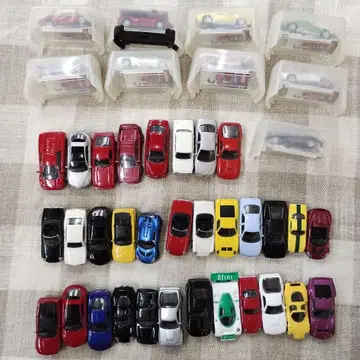 KYOSHO라고 적힌 작은 미니카 여러 가지 묶음 판매 세트